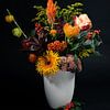 Sunny bouquet of flowers in a white vase by Marjolijn van den Berg