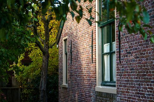 Striking sunlight with shadow on front house authentic farmhouse
