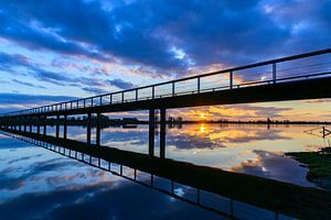 Sunset over the Vreugderijkerwaard and the river IJssel 