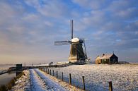 Mühle im warmen Sonnenlicht eines Wintersonnenaufgangs von iPics Photography Miniaturansicht