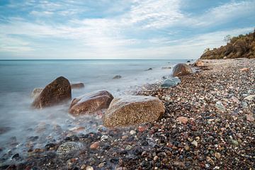 Stones on shore of the Baltic Sea in Elmenhorst, Germany by Rico Ködder
