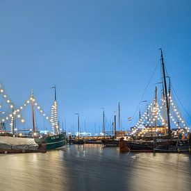Illuminated ships in Urk's Westerhaven by R Smallenbroek