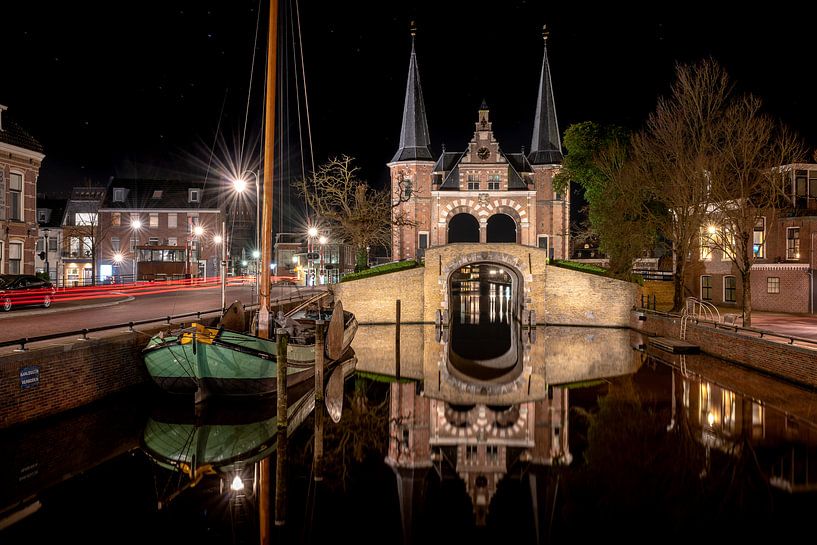 Mirroring Sneker skûtsje and water gate in Sneek city canal by Fotografiecor .nl