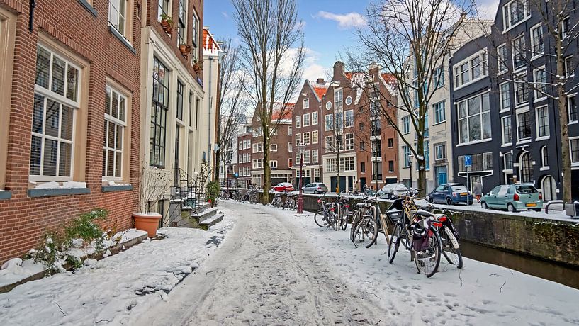 Snowy Amsterdam in winter by Eye on You