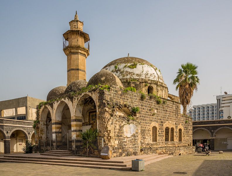 Dilapidated mosque with minaret in the center of Tiberias in Israel by Joost Adriaanse