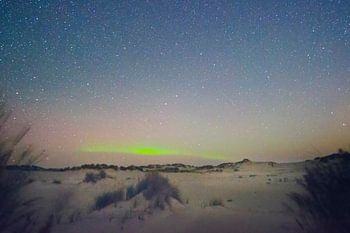 Pulserend noorderlicht in het gebied van de levende duinen .