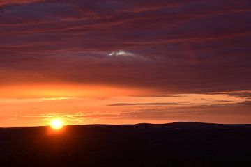 A sunrise on an autumn morning by Claude Laprise