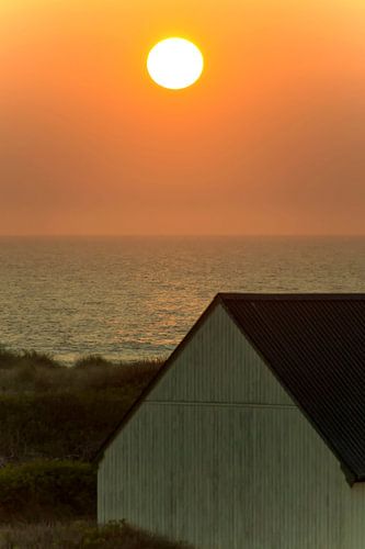 Coucher de soleil sur la côte de la mer du Nord sur Kirsten Warner