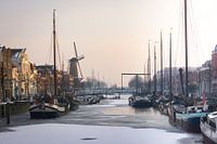 The old harbour Delftshaven lies peacefully in the late afternoon