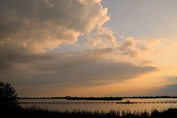 Silhouette in the sunset over Lake Dane by Jurjen Melinga