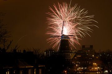 New Year's Eve in the capital. Fireworks behind mill de Gooijer. by Richard Wareham