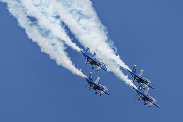 Blue Angels #5 and 6 in action during airshow. by Jaap van den Berg