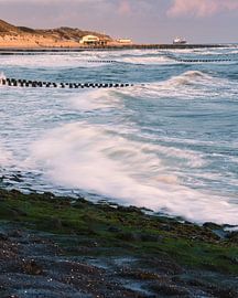 The surf on the North Sea, with the coastline and a ship by Jens Seßler