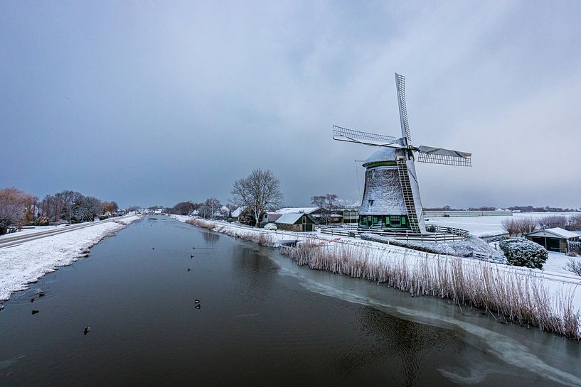 View of the ring canal in winter and mill with snow by peterheinspictures