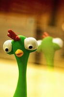 Grüne Ente mit großen Augen