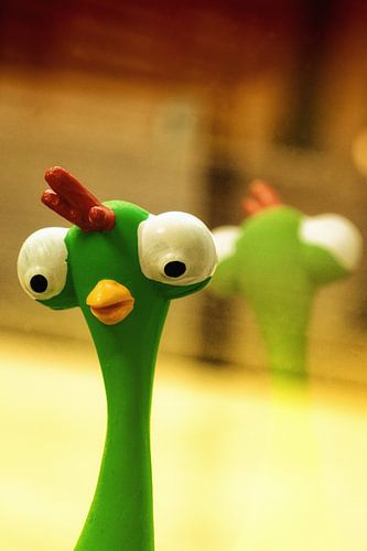 Grüne Ente mit großen Augen