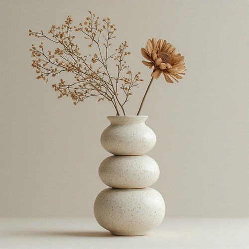 A wabi-sabi Japandi vase with dried flowers.