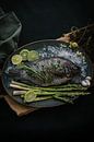 Fish dish with asparagus food photography by Daisy de Fretes thumbnail