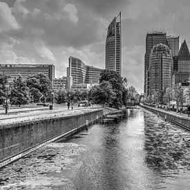 Hague canal with view of high-rise buildings by Carla van Zomeren