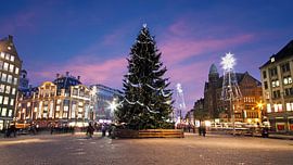 Christmas lights on Dam Square in Amsterdam at sunset by Eye on You