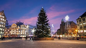 Christmas lights on Dam Square in Amsterdam at sunset by Eye on You