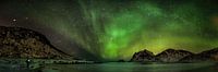 Aurora Borealis in Norway with starry sky