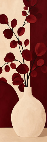 Branches de feuilles bordeaux dans un vase crème