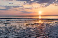 zonsondergang  aan het strand
