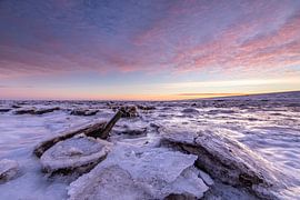 Big ice floes on the Waddensea with a beautiful sunrise! by Peter Haastrecht, van