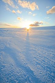 Sunset in the winter landscape by Leo Schindzielorz