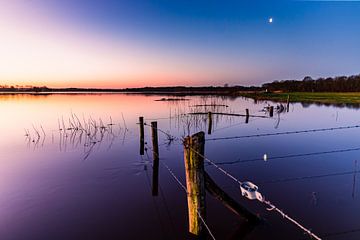 Maan ondergang te Junne van WILBERT HEIJKOOP photography