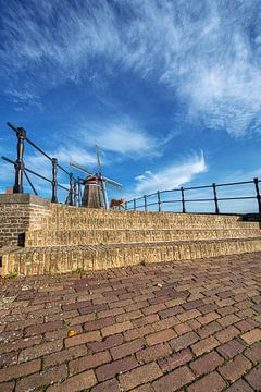 Atop the entrance gate to the Frisian town of Sloten by Harrie Muis