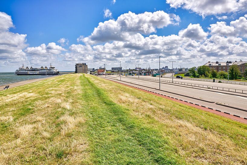 The dike at Den Helder with view on the ferry harbour by eric van der eijk