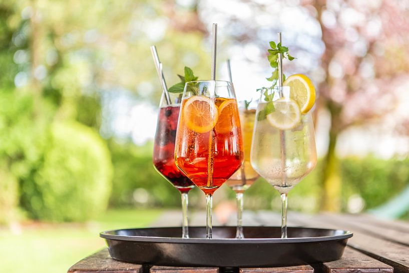 Fruity cocktails on a table in the beer garden by Annabell Gsödl