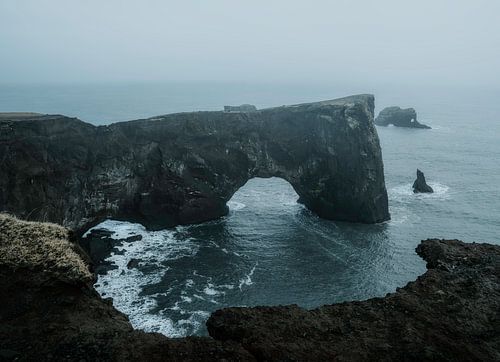 Arch in iceland near black sand beach