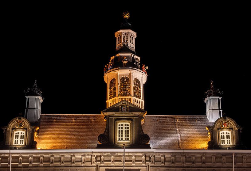 Roermond's illuminated Town Hall roof at night by Triki Photography
