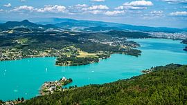 A view of the churches of Maria Woerth on Lake Woerthersee in Austria. by Andreas Völkel