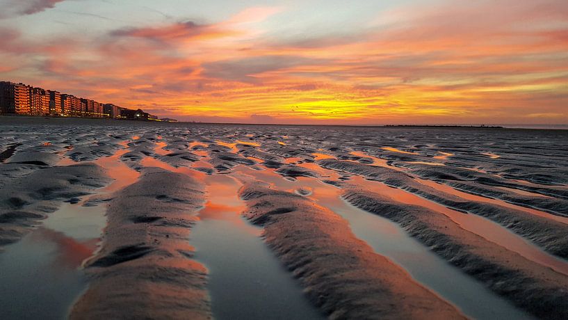 Sunset on beach by RJH van de Kimmenade