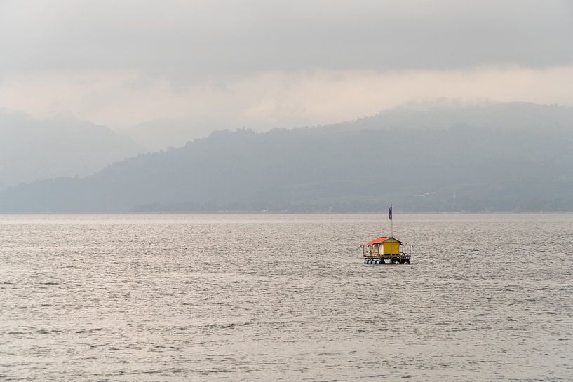 Floating fisherman's house in the bay of Ambon, Moluccas, Indonesia by Zero Ten Studio