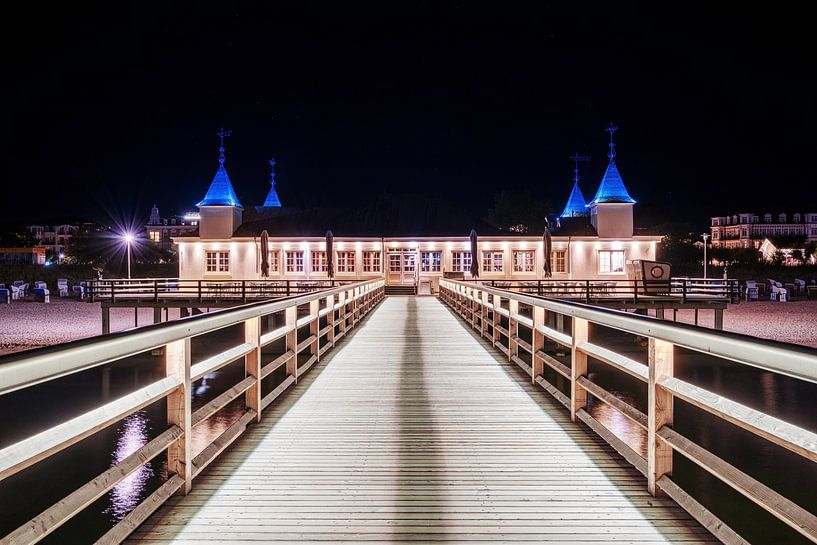 A view of the pier in Ahlbeck on the Baltic Sea at night by Andreas Völkel