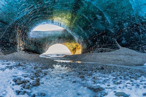 Sunrise in an ice cave in Iceland
