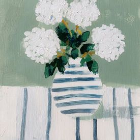 A minimalist still life with white flowers by But First Framing