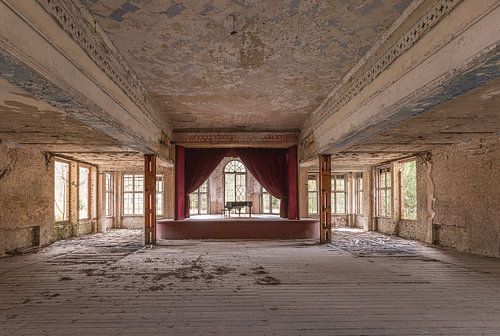 Dance hall with piano in an abandoned sanatorium