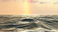 Regenboog over de zee