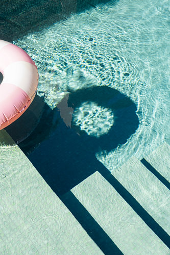 Stairs in pool with pink swimming band | travel photography print