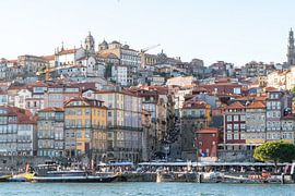Porto's skyline by the river in soft evening light