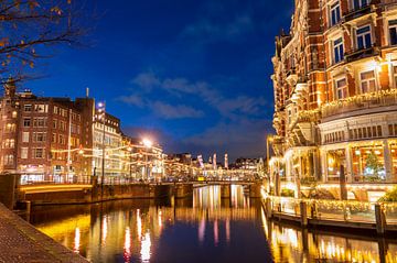 Amsterdam beleuchtete Brücken an der Amstel und am Muntplein