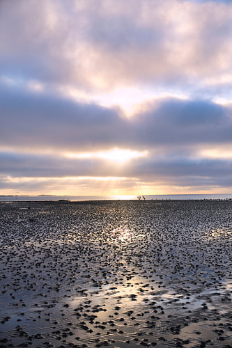 A breathtaking view of the sky above the mudflats