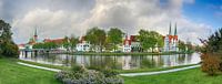 Wide panorama of the historic old town of Luebeck at the river Trave in northern Germany, Baltic Sea