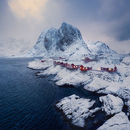 Rode huisjes in een winterse stilte